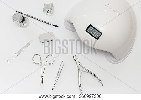 Manicure Kit Gel Nail Polish On White Background