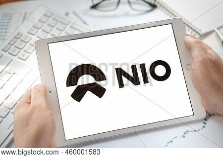 Logo Of Bitcoin Nio Coin In Tablet. Cryptocurrency Btc Nio Token. Btcnio Trading Blockchain Platform