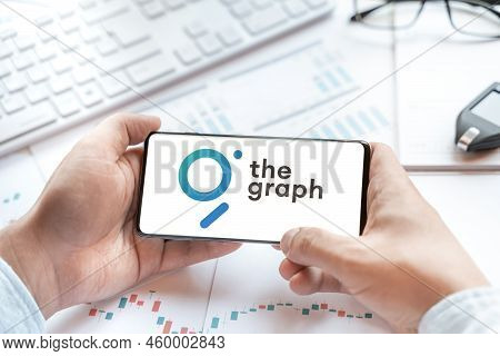 Logo Of Graph Coin In Tablet. Cryptocurrency Grt Token. Trading Blockchain Platform To Buy,sell On D