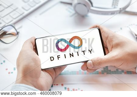 Logo Of Dfinity Foundation Internet Computer In Tablet. Cryptocurrency Icp Coin, Token. Trading Bloc