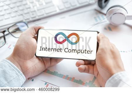 Logo Of Dfinity Foundation Internet Computer In Tablet. Cryptocurrency Icp Coin, Token. Trading Bloc
