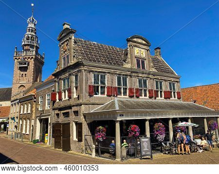 Monnickendam, Netherlands - August 10, 2022: Historic House Facades Located At The Harbor Of Monnick