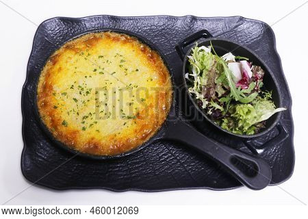Traditional English Cottage Pie With Mixed Leaves Salad