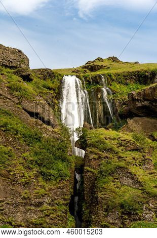 Þórsmerkurvegur, Iceland - July 3, 2022 Vertical View Of Gljúfrafoss Or Gljúfrabúi A Small Waterfall