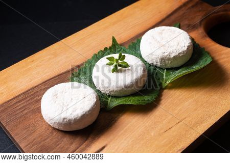 Food Concept French Organic Goat Cheese Picodon Form Southern France On Wooden Board With Copy Space