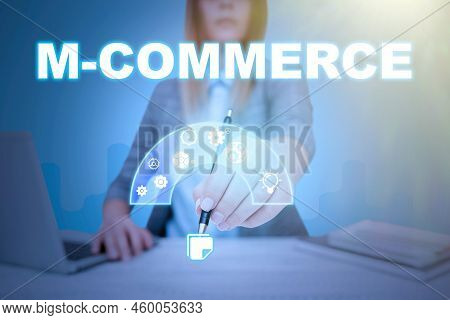 Conceptual Caption M Commerce. Business Idea Commercial Transactions Conducted Electronically By Mob