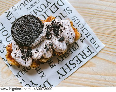 Croffle With Cookie And Cream On Top On The Table