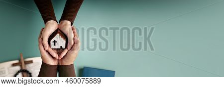 Praying, Spirituality, Religion And Hope Concepts. Two People Embracing A Wooden Model Chirstian Chu
