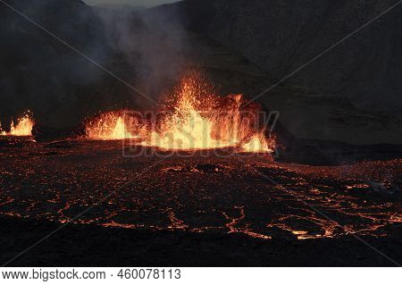 Volcano Eruption At Meradalir Near Fagradalsfjall, Iceland. Erupting Magma And Flowing Lava At Night