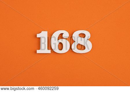 White Wooden Number 168 On Eva Rubber Orange Background