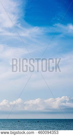 Vertical Panorama Real Photo Natural Cloudscape Wallpaper. Beautiful White Fluffy Cumulus Clouds Sum