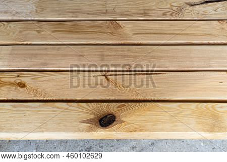 Raw Planed Pine Wooden Beams, Dimensions 100x100mm, Lying Next To Each Other.