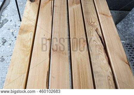 Raw Planed Pine Wooden Beams, Dimensions 100x100mm, Lying Next To Each Other.