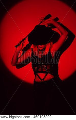 Sexy Woman In Beautiful Underwear Holds A Leather Flogger Whip In Her Hands For Bdsm Sex With Submis