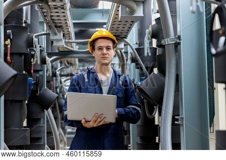 Industrial Engineer Work On Site. Engineer Visit And Inspection Site Engineer At Industrial Site. In