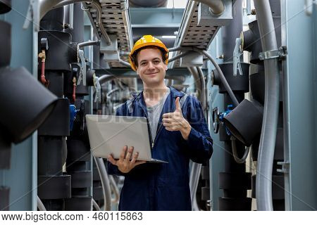 Industrial Engineer Work On Site. Engineer Visit And Inspection Site Engineer At Industrial Site. In