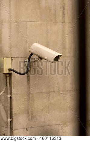Close Up Of White Surveillance Camera Mounted On Facade Ccd Video Surveillance Security And Monitori