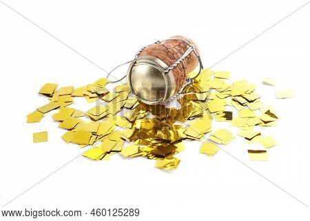 Cork Of Sparkling Wine With Muselet Cap And Shiny Golden Confetti On White Background