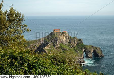 Stone Footpath To Famous Landmark And Film Location In North Of Spain, Ocean Islet With Chapel San J