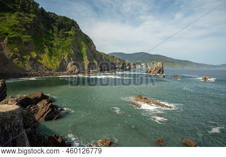 Stone Footpath To Famous Landmark And Film Location In North Of Spain, Ocean Islet With Chapel San J