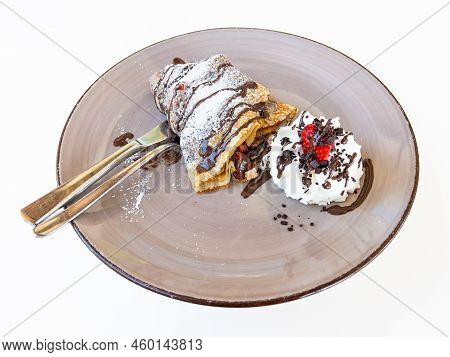 Pancake With Chocalate, Strawberries And Cream On A Vintage Plate. Isolated Picture Of A Sweet Desse