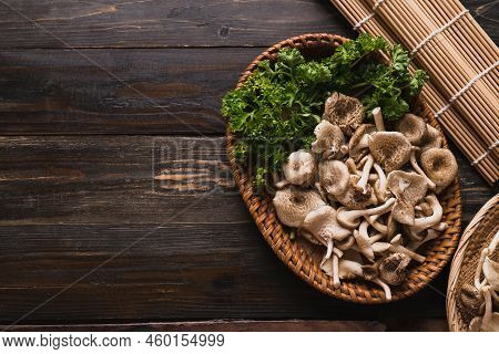 Fresh Edible Mushroom In Basket On Wooden Background, Organic Food Ingredients In Seasonal, Table To