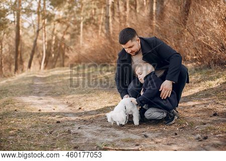 Cute Family Playing In A Summer Park