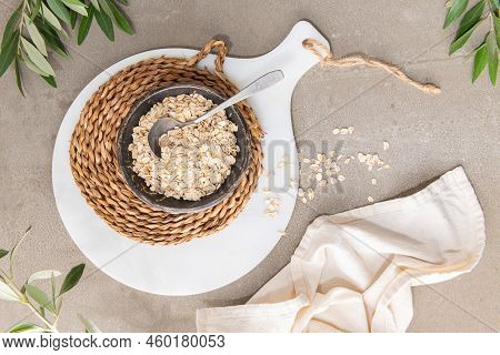 Dry Thick Oat Flakes In A Ceramic Bowl In Kitchen Counterto. Concept Of Healthy Eating, Dieting, Die
