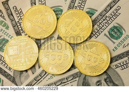 Bitcoins On American Dollars.  Cryptocurrency - Financial Conceptual Image.