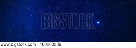Tellar Milky Way At Night With Stars. Panorama Of The Dark Blue Starry Sky