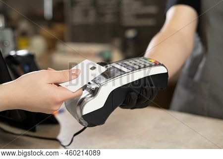 Contactless Debit Card Payment, Customer Hand Paying Contactless Credit Card With Nfc Technology. Ba