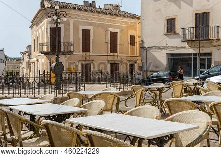 Arta, Spain; August 13 2022: Close-up Of Tables In An Empty Restaurant. In The Background, The Metal