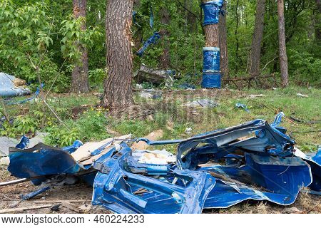 Shot, Damaged Cars During The War In Ukraine. The Vehicle Of Civilians Affected By The Hands Of The 
