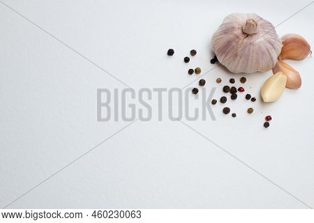 A Close Up Of Garlic And Isolated On A White Background