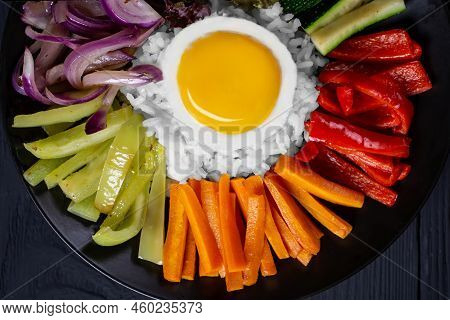 Korean Dish, With A Variety Of Appetizers With Vegetables And Eggs. Diet. Bibimbap. Top View. Round