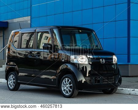 Novosibirsk, Russia -   August 03, 2022:   Black Honda N-box,  Is Parked  On The Street On A Warm Su