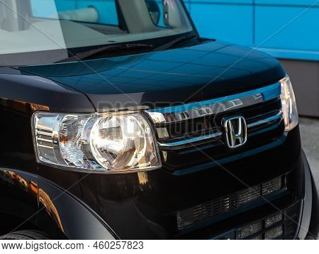 Novosibirsk, Russia -   August 03, 2022:  Black Honda N-box,  Side Glass, Wheel, Bumper And Hood