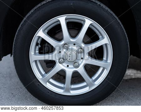 Novosibirsk, Russia -   August 03, 2022:   Honda N-box,  Front Wheel Of A Black Car, Rear View