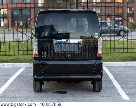 Novosibirsk, Russia -   August 03, 2022:  Black  Honda N-box,   Back View.  Hatchback  Car   On A Pa