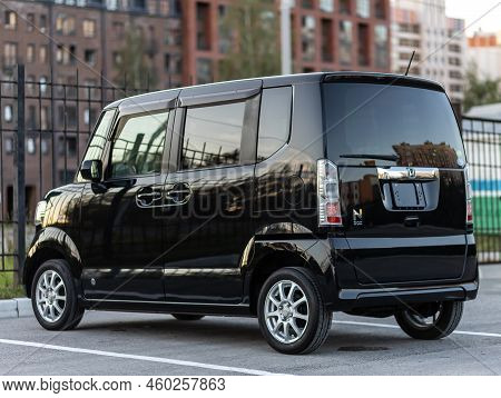 Novosibirsk, Russia -   August 03, 2022:  Black  Honda N-box,   Back View.  Hatchback  Car   On A Pa