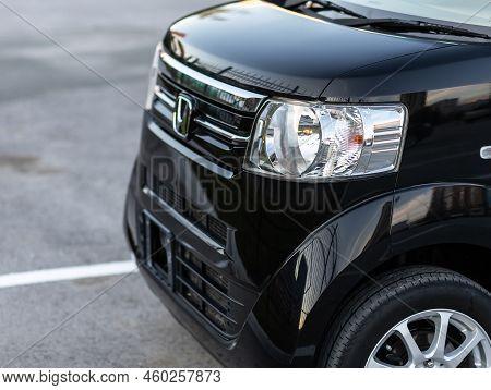 Novosibirsk, Russia -   August 03, 2022:  Black Honda N-box,  Side Glass, Wheel, Bumper And Hood