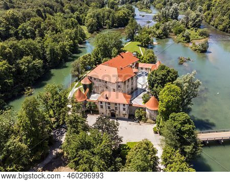 Romantic Otocec Castle On Krka River In Slovenia. Drone View.