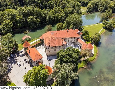 Romantic Otocec Castle On Krka River In Slovenia. Drone View.