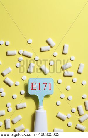 Titanium Dioxide, E171, Dangerous Additive Concept. Gum, Pills, Toothpaste Or Cream And Sign With E1