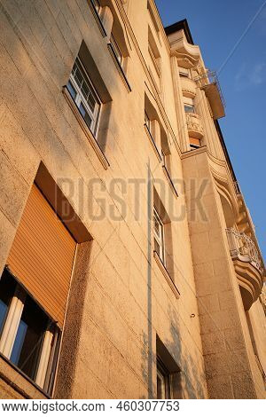 Flats Of A Tall Building In Sunset