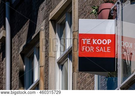 Te Koop (for Sale In Dutch) On The Facade Of A Building In Amsterdam