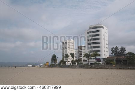 Bahia De Caraquez, Manabi / Ecuador - August 19 2022: People Walking And Playing On The Beach In Fro