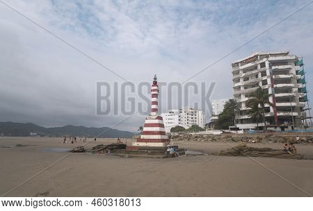 Bahia De Caraquez, Manabi / Ecuador - August 19 2022: People Walking And Resting Near The Lighthouse