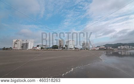 Bahia De Caraquez, Manabi / Ecuador - August 19 2022: People Walking And Playing On The Beach In Fro