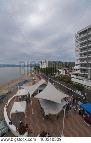 Bahia De Caraquez, Manabi / Ecuador - August 21 2022: People Walking On The Boardwalk Of The City Ne